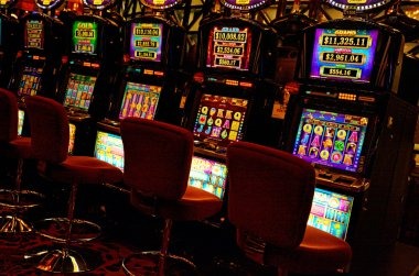 Wild Coaster slot game interface showing cascading reels and carnival theme